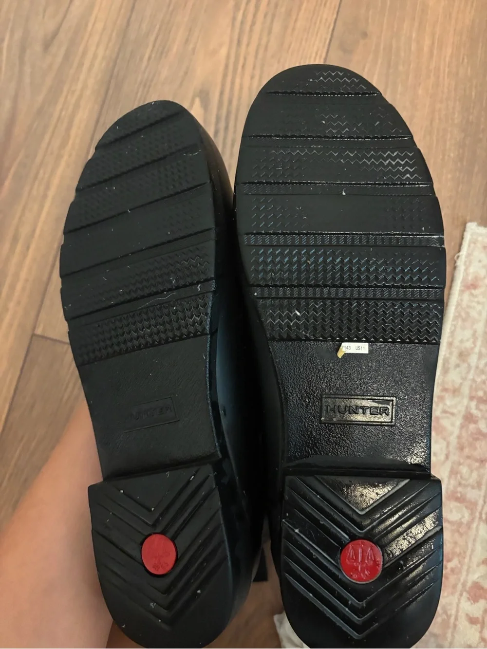 Hunter Black Rubber Slip-On Rain Boots with Treaded Outsole